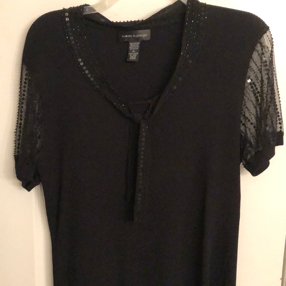 black top with sequin sheer sleeves